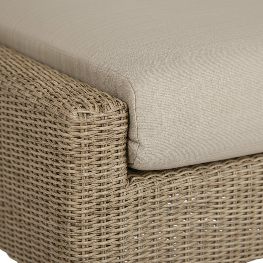 Summer House Patio Coral Collection ottoman with natural woven wicker, Sand Sunbrella cushion, and Ipe timber base.